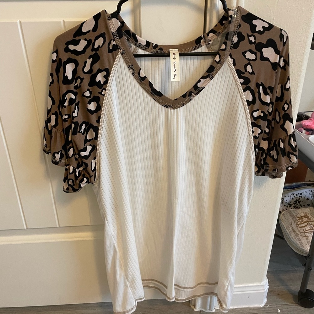 White blouse with leopard sleeves size Medium
